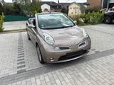 Nissan Micra Cabrio 1,6 L - Nissan Micra mit Benzin-Antrieb: Cabrio, 1.6