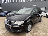 Volkswagen Touran Highline Bi-Xenon/Navi/SHZ/AHK/PDC