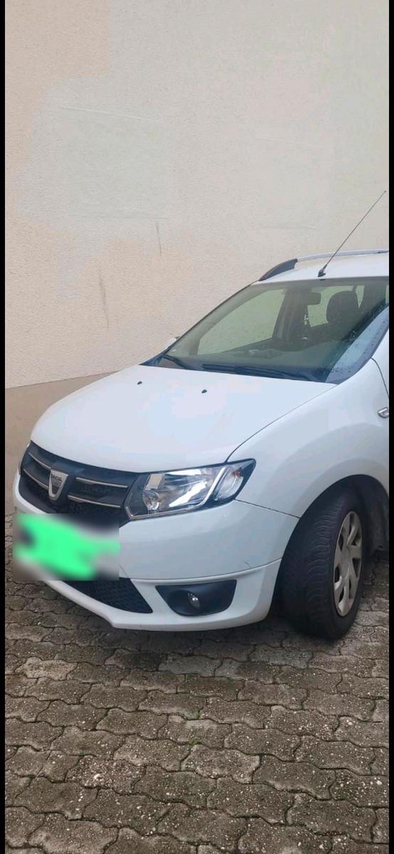 Dacia Logan 2013 — вигляд ззаду