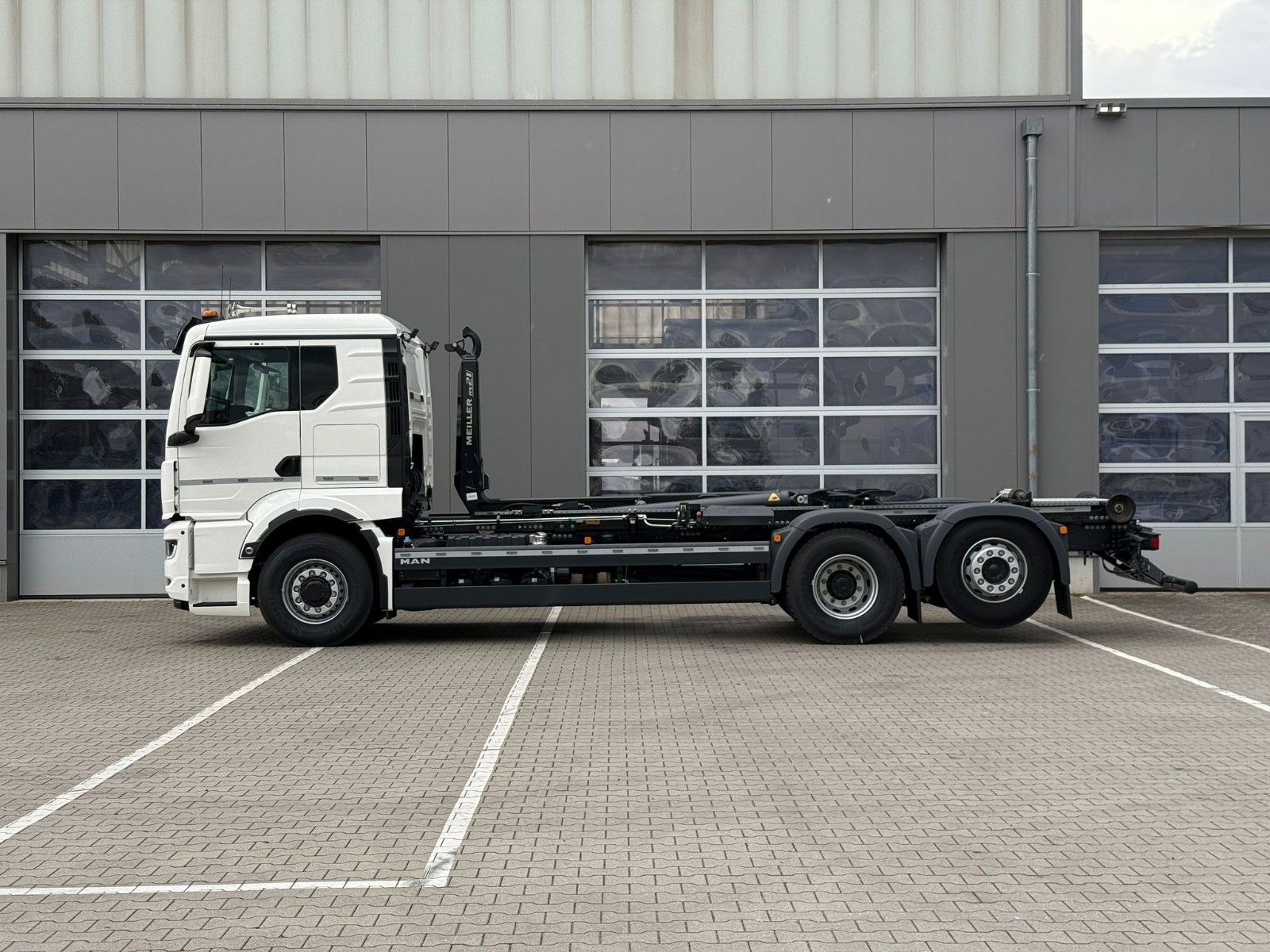 Fahrzeugabbildung MAN TGS 26.520 6x4H-2 BL MEILLER RS 21.70 Funkfernb.