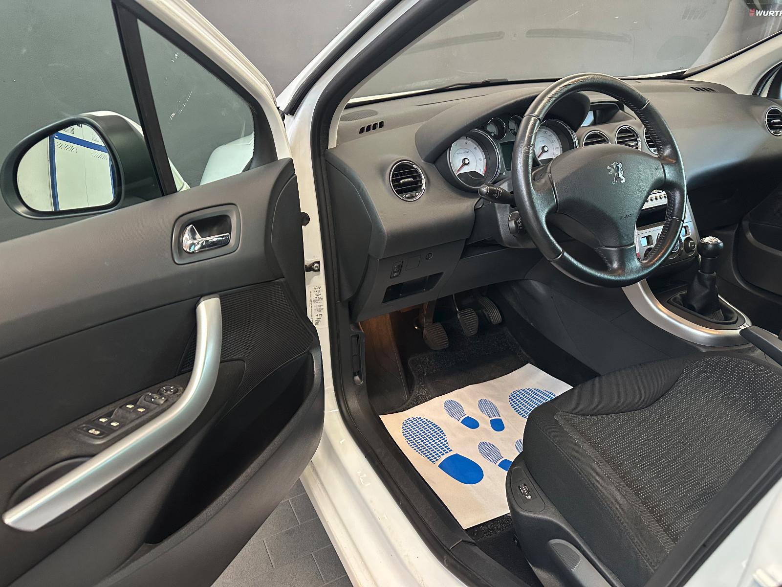 Peugeot 308 2009 — photo 10