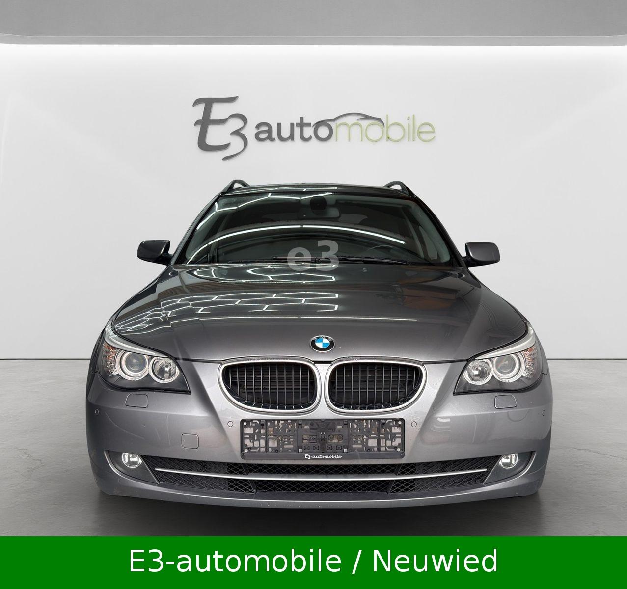 BMW 520 2009 — rear view