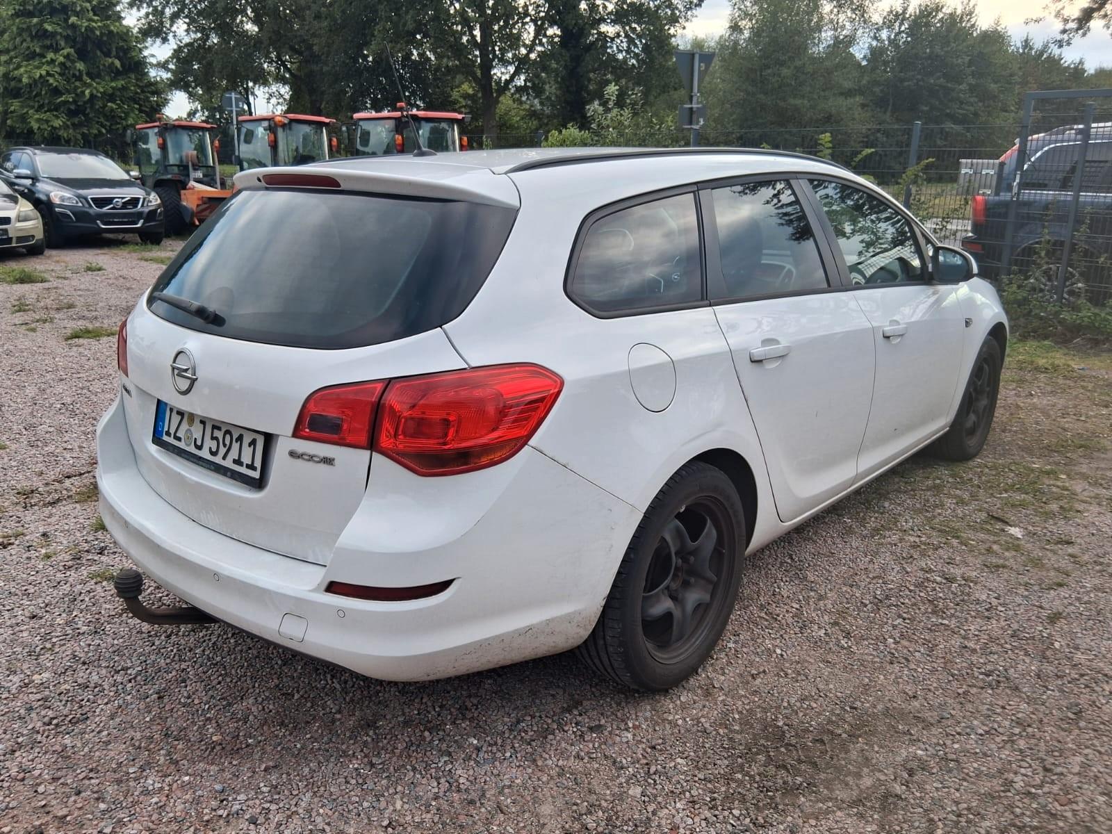 Opel Astra 2011 — engine 1.956 cm³, 165 HP (121kW)