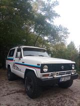 Nissan Patrol DATSUN TR160 (K160) - weiße Nissan Patrol