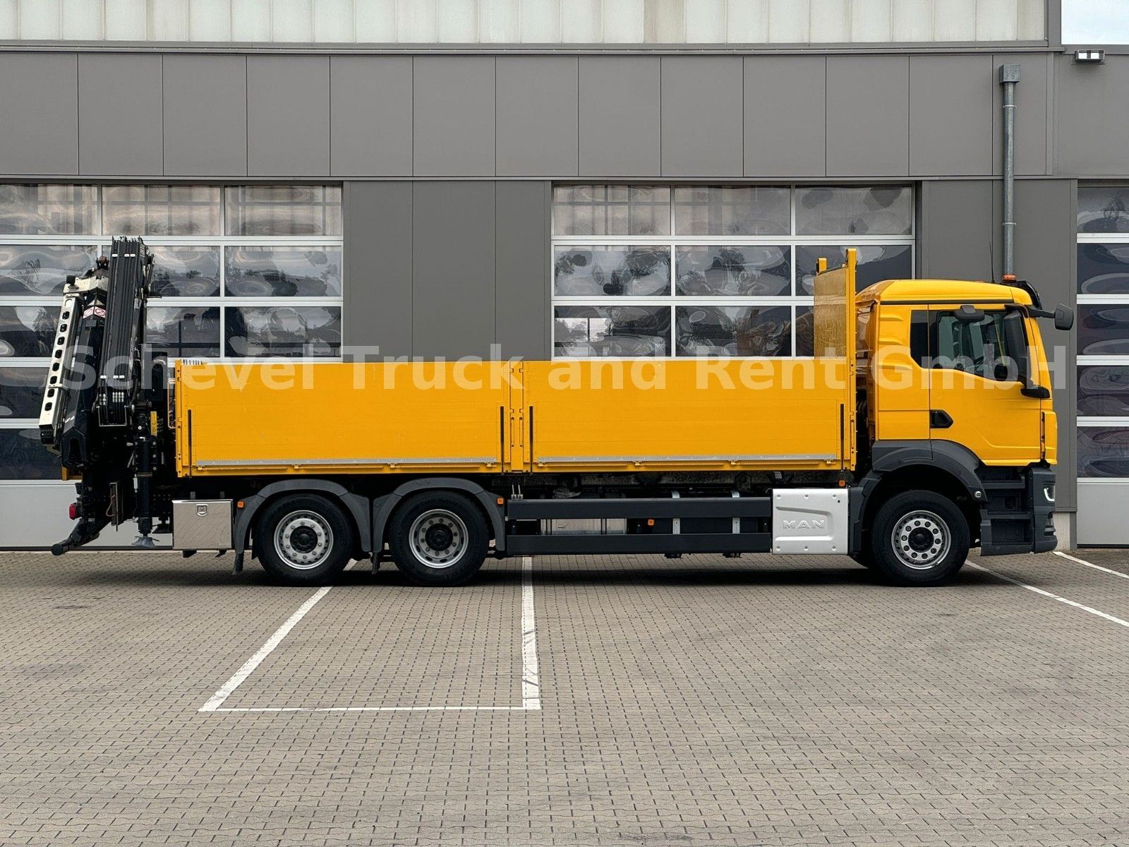 Fahrzeugabbildung MAN TGS 26.430 6x2-4 Pritsche mit FASSI F235