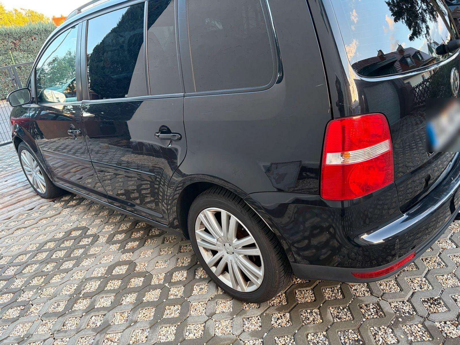 Volkswagen Touran 2006 — engine 140 HP (103kW)