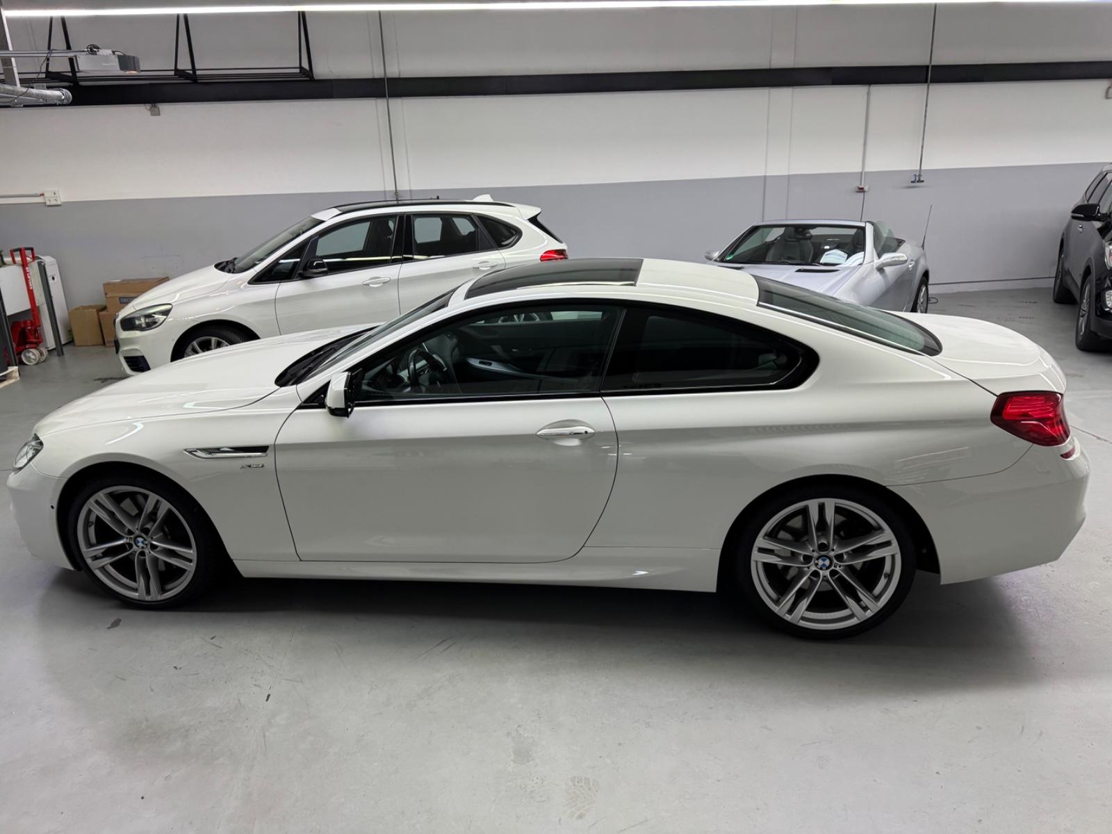 BMW 650 i xDrive Coupé V8 408 ch – Pack M – Toit panoramique – Sièges confort ventilés et chauffants – HUD – Caméras 360°