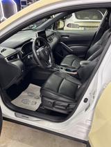 Toyota Corolla Cross 1.8-l-VVT-i Hybrid Team Deutsc... - weiße Toyota Corolla Cross