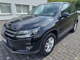 Volkswagen Tiguan 1,4 Trend & Fun BMT-Navi-AHK-TÜV neu - gebrauchte VW Tiguan aus dem Jahr 2011