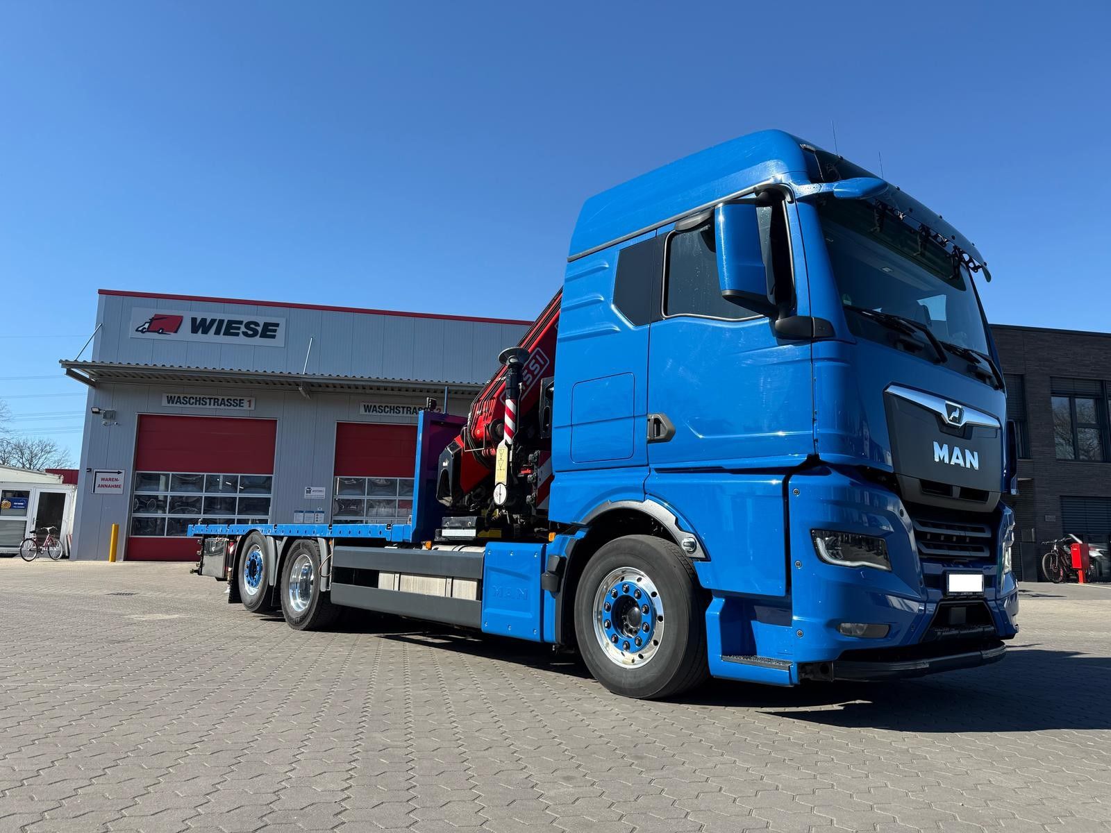 Fahrzeugabbildung MAN TGX 26.640 mit Fassi F365A2.26 Containerpritsche