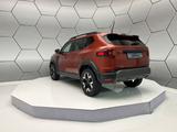 Dacia Duster III Hybrid 140 Extreme City/ Winterpaket - mit Hybrid-Antrieb: Braun