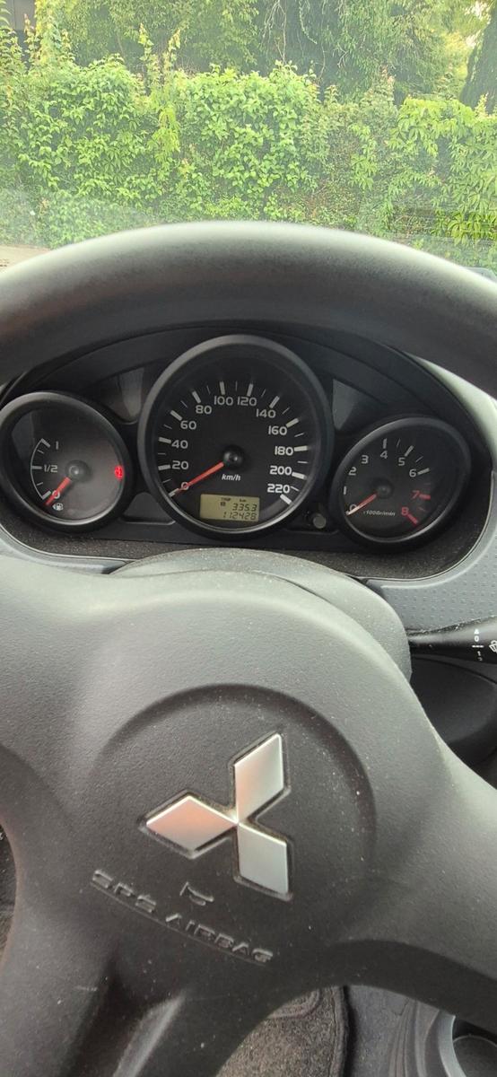 Mitsubishi Colt 2006 — photo 12