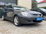 Mitsubishi Lancer Lim./ Sport Kombi,MOMO,Klima,TÜV+AU Neu - gebrauchte Mitsubishi Lancer aus dem Jahr 2004