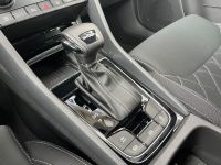 Skoda Karoq 1.5 TSI DSG Sportline PANO KAM AHK 4JGAR bei Autohaus Landmann & Maier OHG
