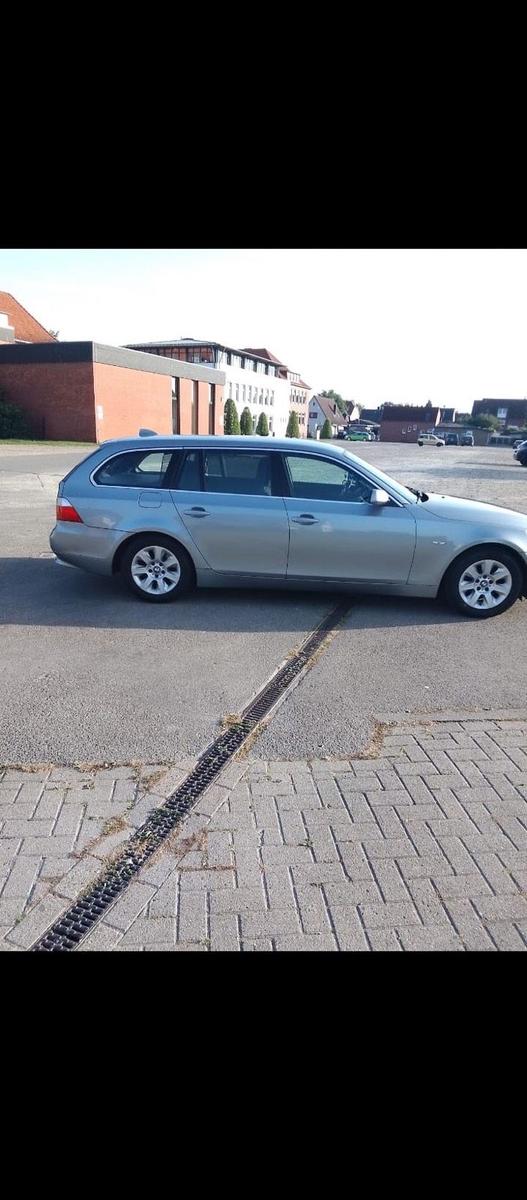 BMW 520 2006 — rear view