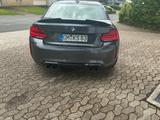 BMW M2 LCI F87 in grau ohne OPF mit HJS Downpipe - gebrauchte BMW M2 aus dem Jahr 2017