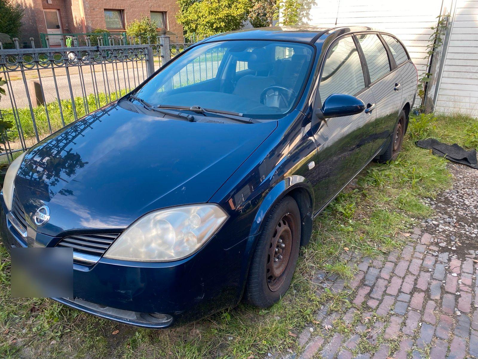 Nissan Primera 2006 — rear view