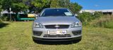 Ford Focus Lim. Ghia *DAB+*Navi*Bluetooth*PDC*R&LSens - Ford in Gladbeck