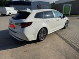 Toyota Corolla 1,8 Hybrid Team Deutschl Touring Spo... - scheckheftgepflegte Toyota Corolla
