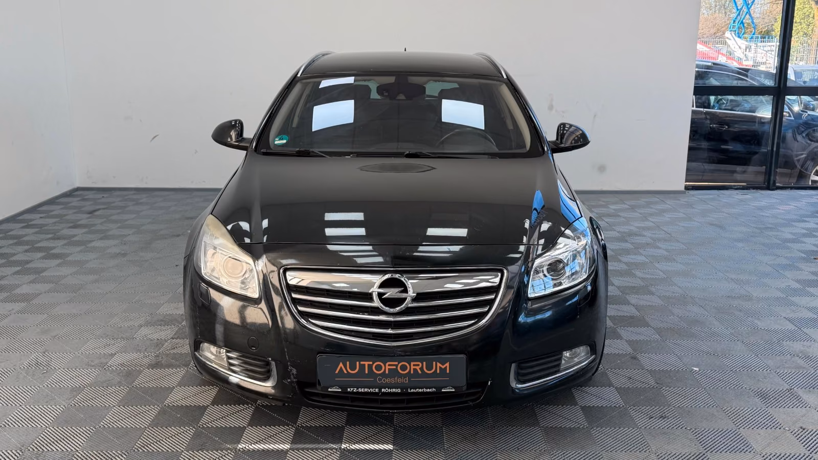 Opel Insignia 2009 — вигляд ззаду