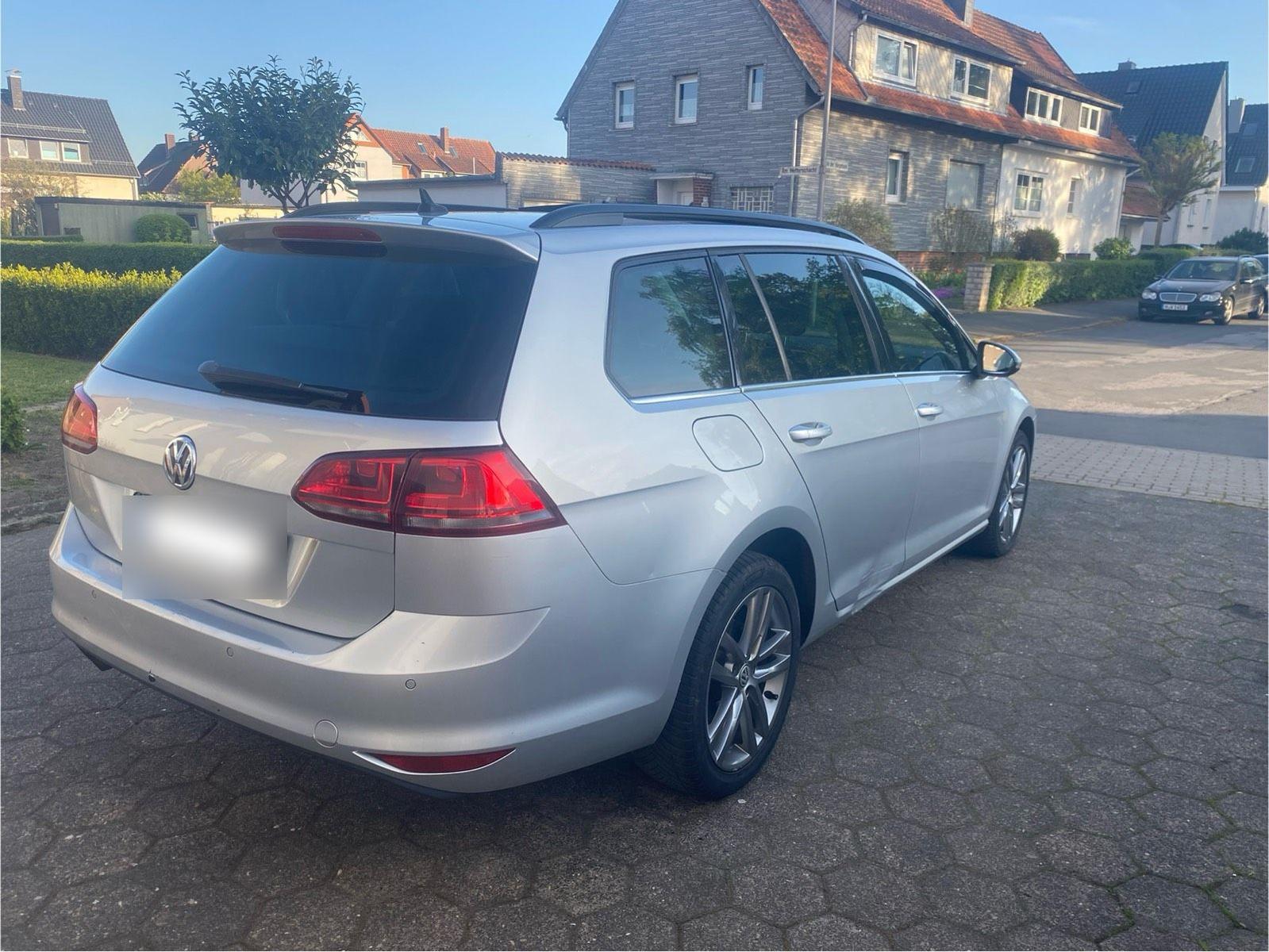 Volkswagen Golf 2013 — вигляд ззаду