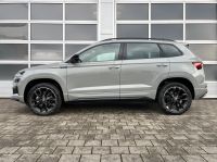 Skoda Karoq 1.5 TSI DSG Sportline NAV AHK MATRIX 5JGAR bei Autohaus Landmann & Maier OHG