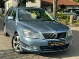 Skoda Octavia Combi DSG Ambiente AUTOMATIK+SHZ+PDC+TEM - Skoda Octavia aus 2010: Kombi
