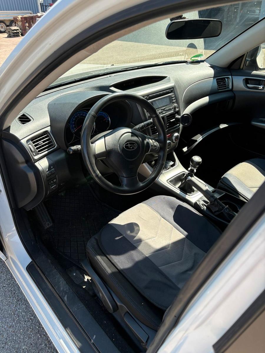 Subaru Impreza 2009 — photo 5