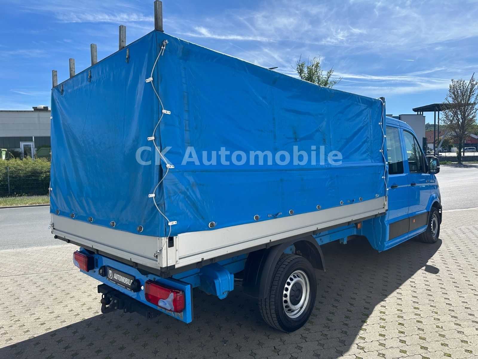 Fahrzeugabbildung MAN TGE 3.180 DoKa Pritsche/Plane 4X4/6 Sitze/AHK
