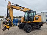 CAT M 318 F - CAT Mobilbagger M318