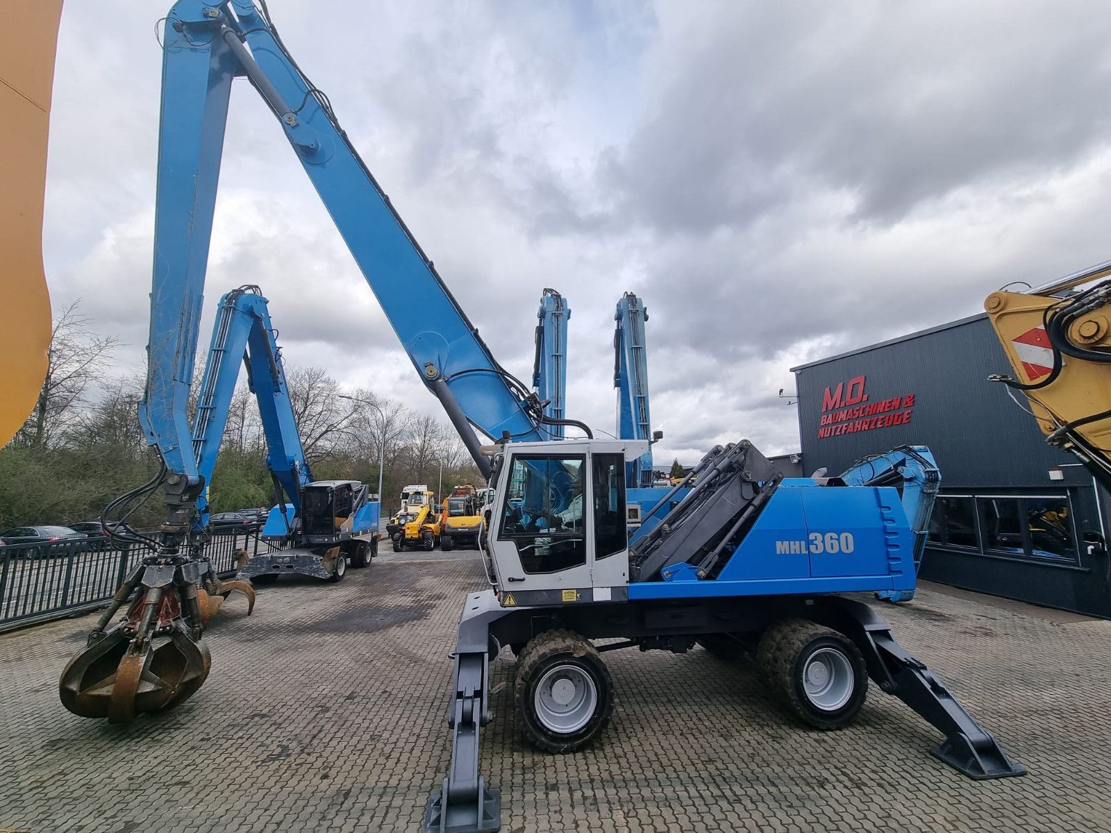 Fahrzeugabbildung Fuchs MHL 360 / AC / Magnetanlage /Polypgreifer /