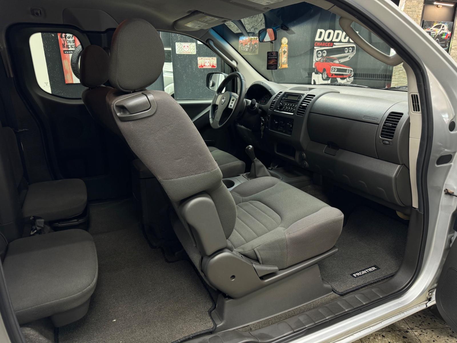 Nissan Frontier 2005 — photo 28