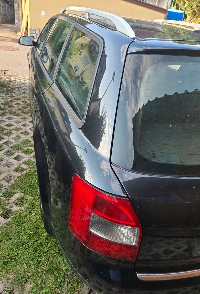 Audi A4 2004 — photo 7
