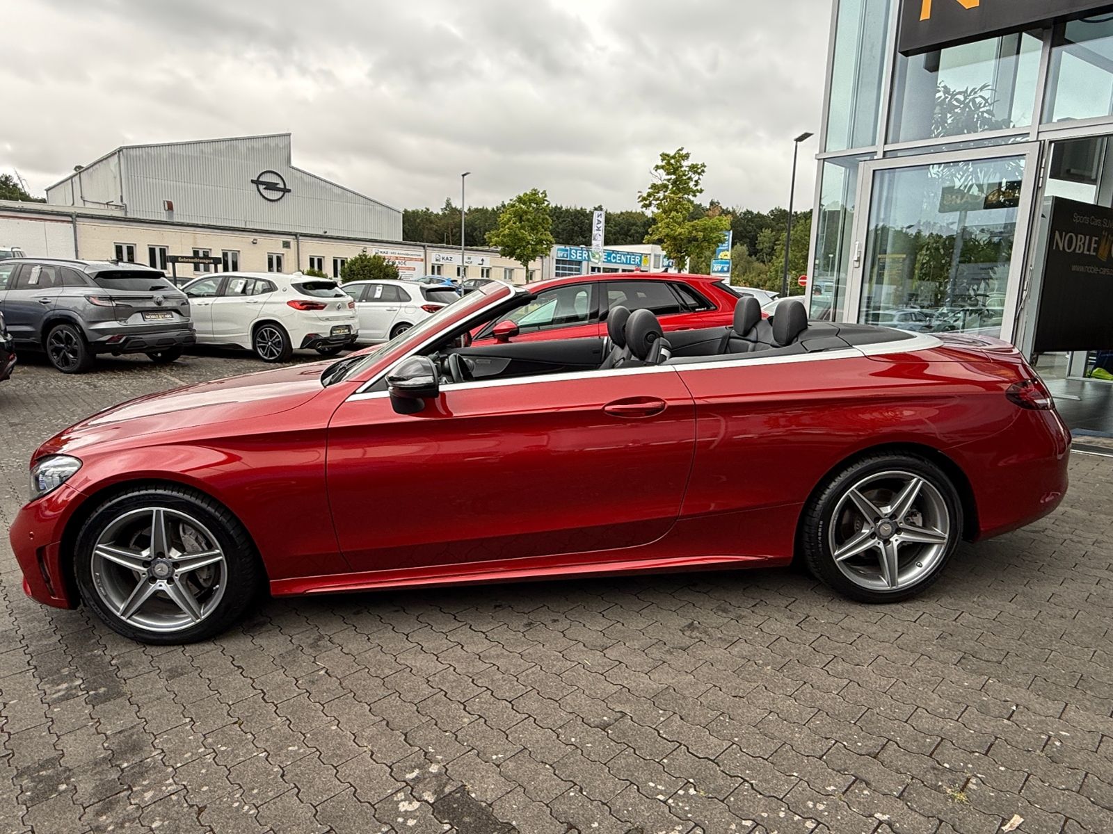 Fahrzeugabbildung Mercedes-Benz C 200 Cabrio AMG NIGHT Navi Rückfahr KAM Sounds.