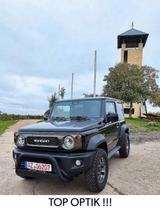 Suzuki Jimny 1.5 ALLGRIP Comfort+ 1 Hd. nur 17tkm OPTIK - Suzuki Jimny: Schwarz