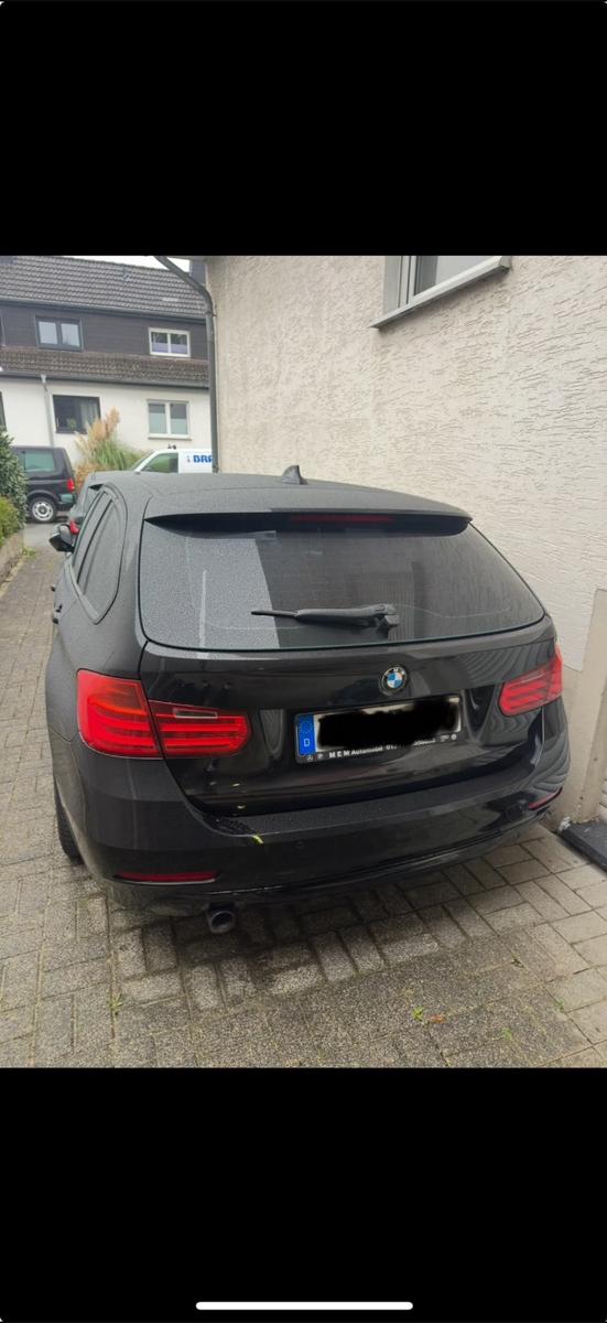 BMW 320 2013 — rear view