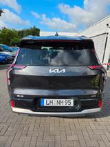 Kia EV9 GT-Line AWD | 7-Sitzer | 5.400 km | Fast - graue Kia EV9