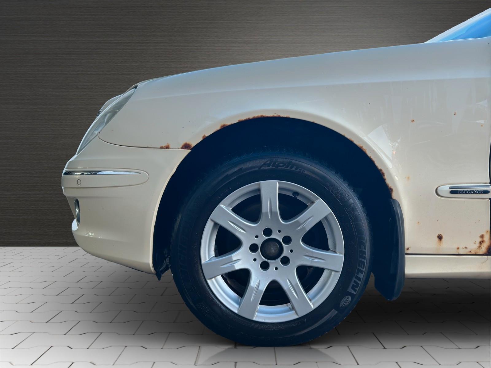 Mercedes-Benz E200 2008 — photo 19