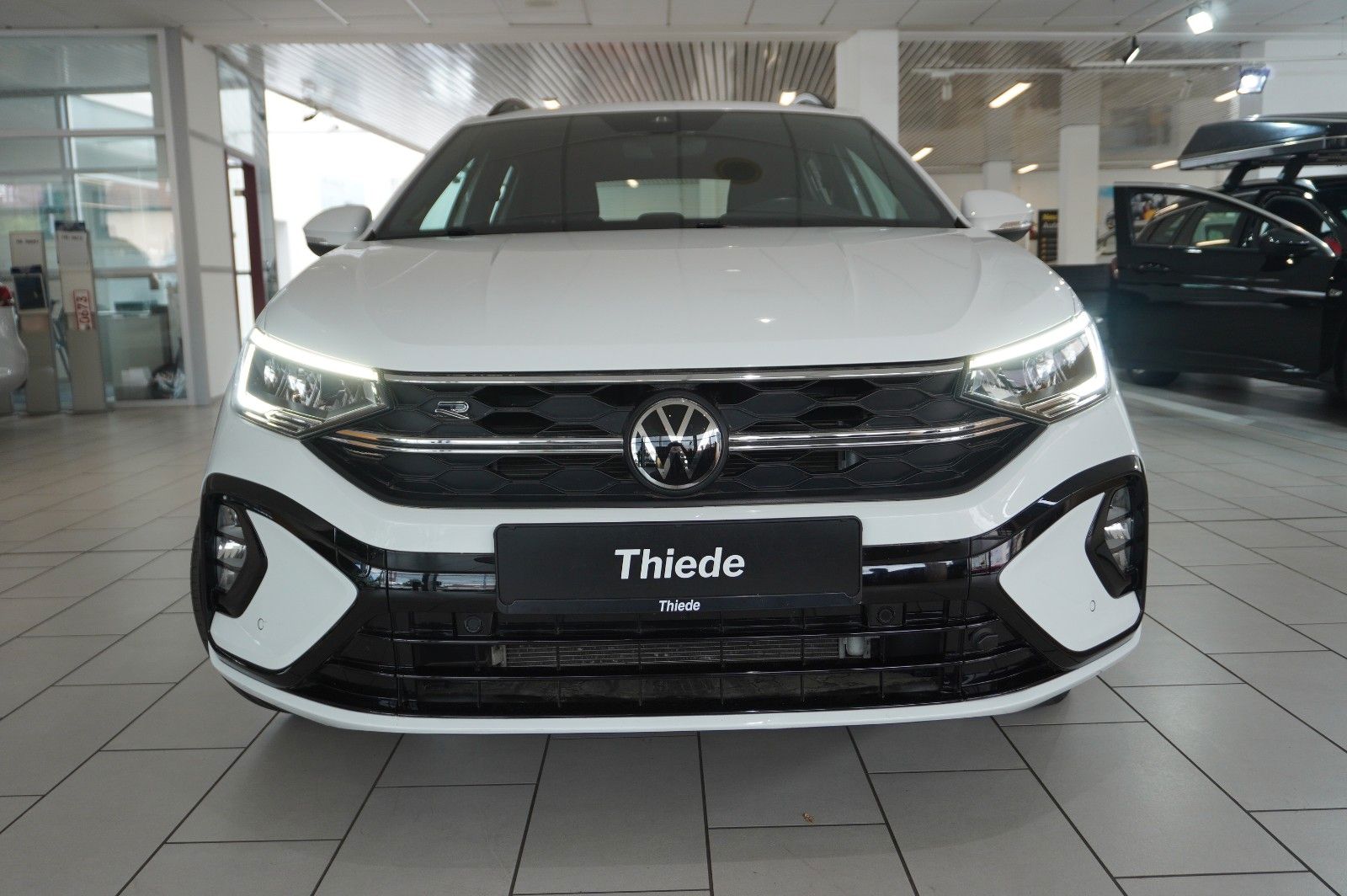 Fahrzeugabbildung Volkswagen Taigo 1.0 TSI R-LINE NAVI/LED/KAMERA/SPORT/DAB+