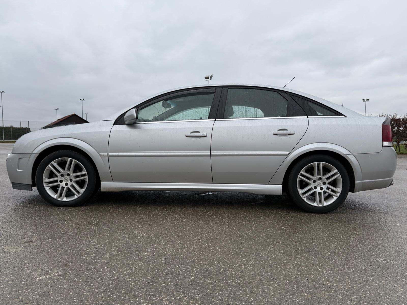 Opel Vectra 2004 — photo 14