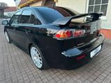 Mitsubishi Lancer 35 Jahre *XENON*CAM*SITZHZG* - schwarze Mitsubishi Lancer