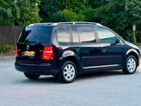 Volkswagen Touran Trendline/SHZ/KLIMA/PDC/TEMPOMAT/8FACH/ - Gebrauchtwagen in Mannheim bis 5.000 Euro
