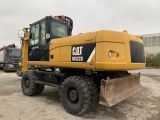 CAT M322D Mobilbagger OQ70/55 Schnellwechsler - CAT Raupe/Dozer D5