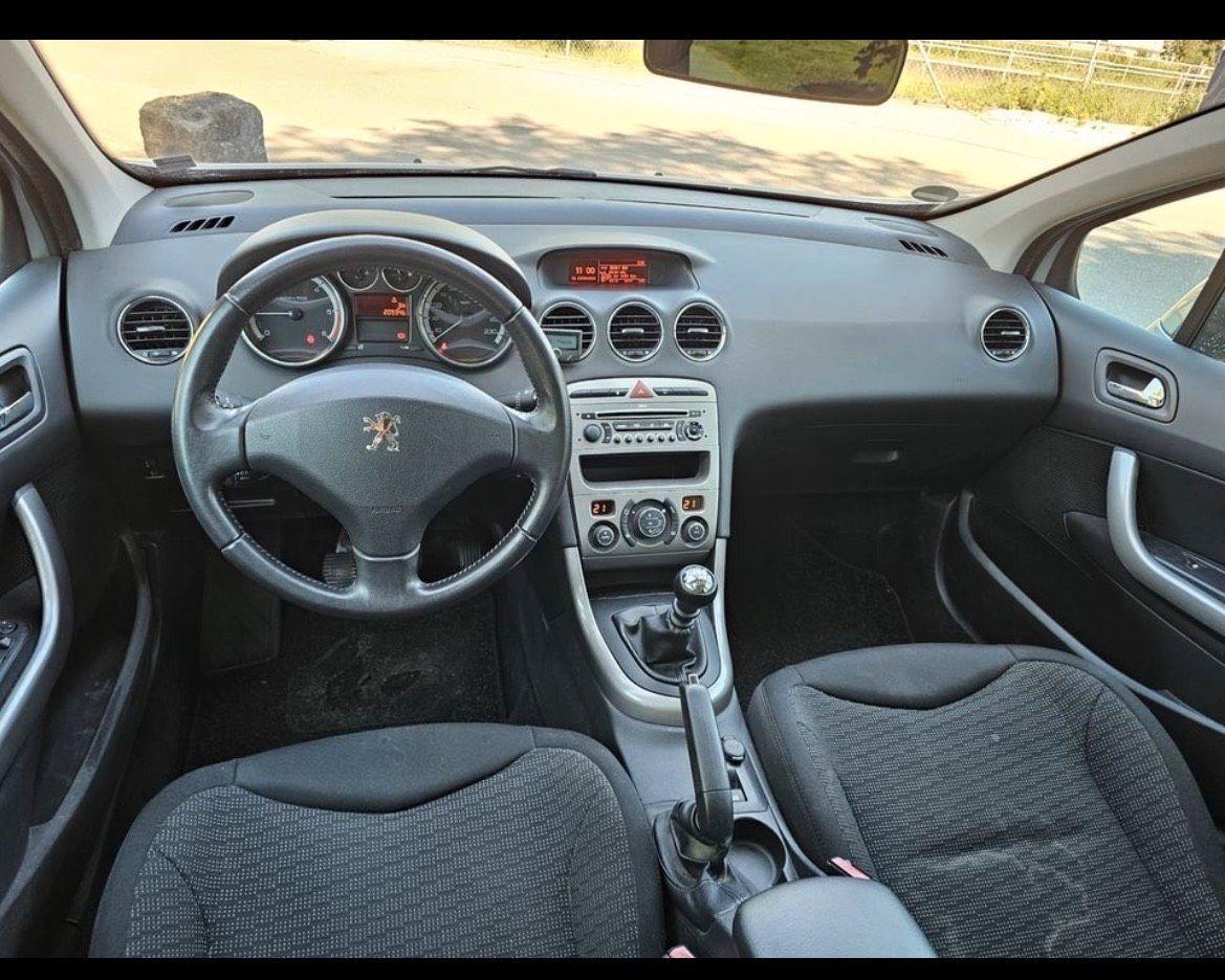 Peugeot 308 2009 — photo 11