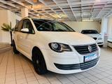 Volkswagen Touran Freestyle*Navi+Multi+Xenon+Hu&Au* - Volkswagen Touran aus 2009: Freestyle
