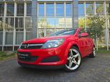 Opel Astra H GTC Sport 1.6 *NAVI*AHK*SHZ*PDC*KLIMAAUT - Opel Astra aus 2007: Sport