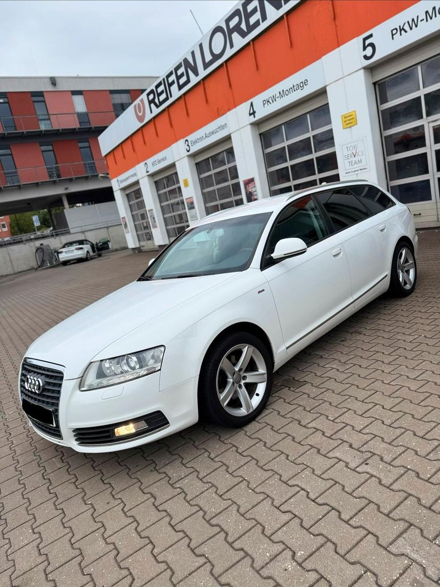 Audi A6 2009 — салон