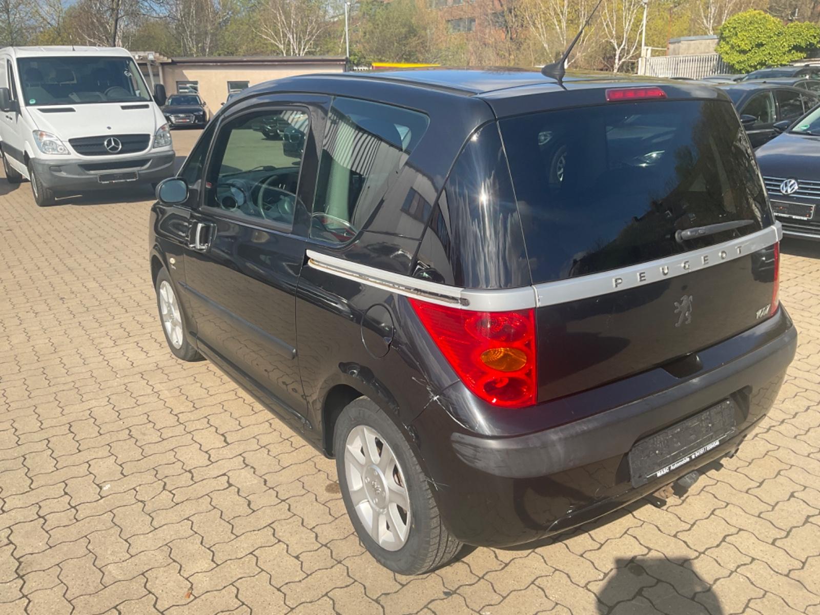 Peugeot 1007 2006 — photo 7