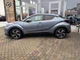 Toyota C-HR 2.0 Hybrid Team Deutschland*AHK*Keyless*SHZ - gebrauchte Toyota C-HR aus dem Jahr 2023