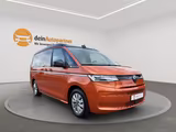 Volkswagen T7 California Beach LÜ 1,5 eHybrid 4M CAMPER/LED - mit Hybrid-Antrieb: Orange, Van